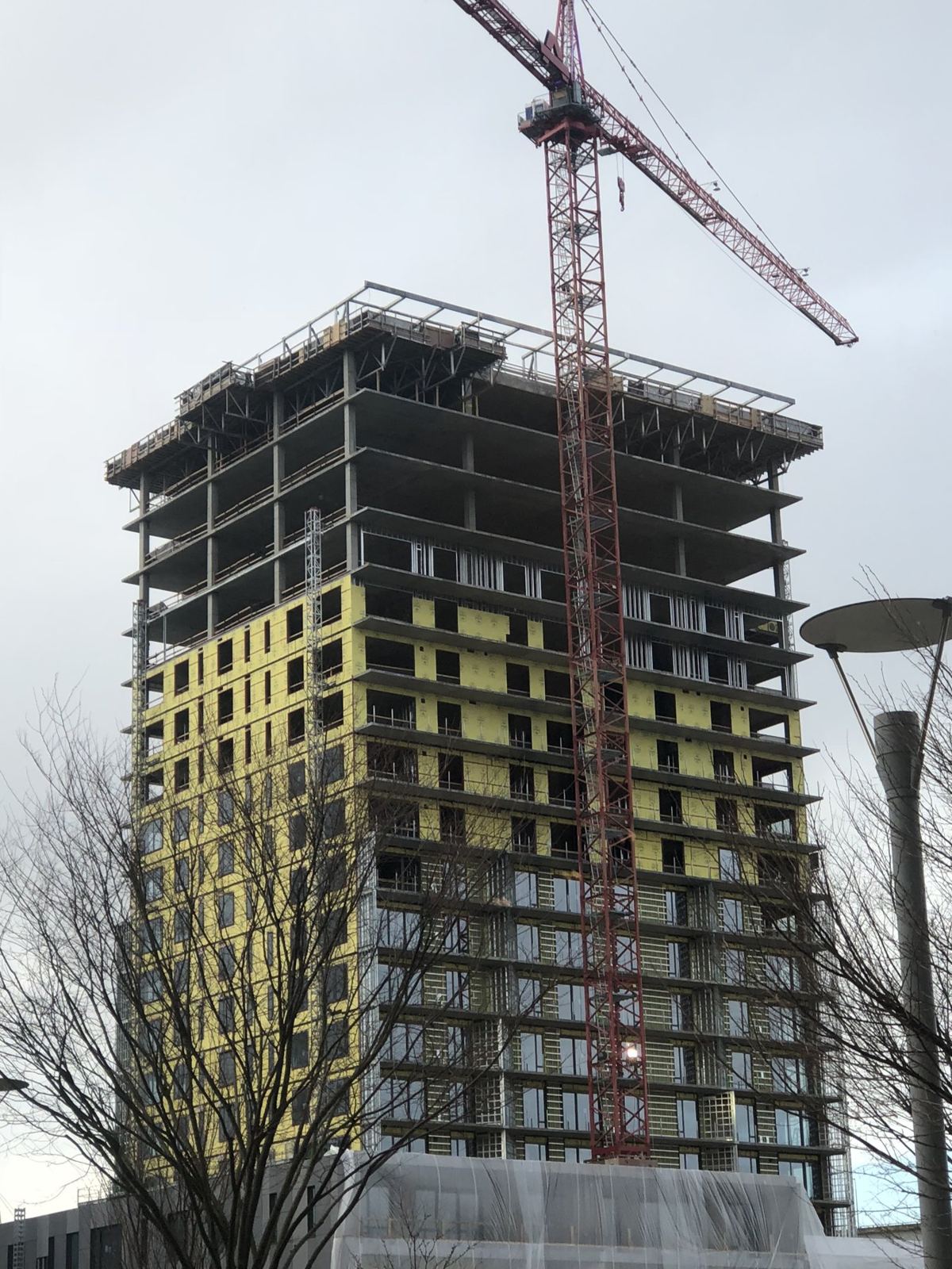 High-rise tower under construction with tower crane
