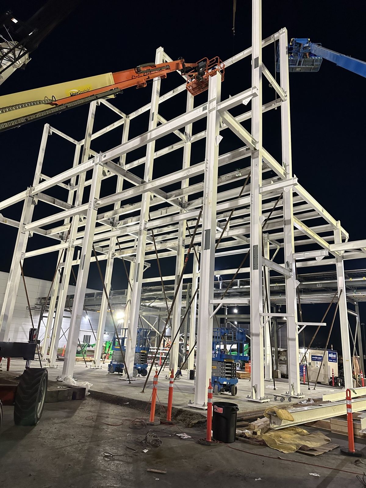 Steel framing erection under lights at night